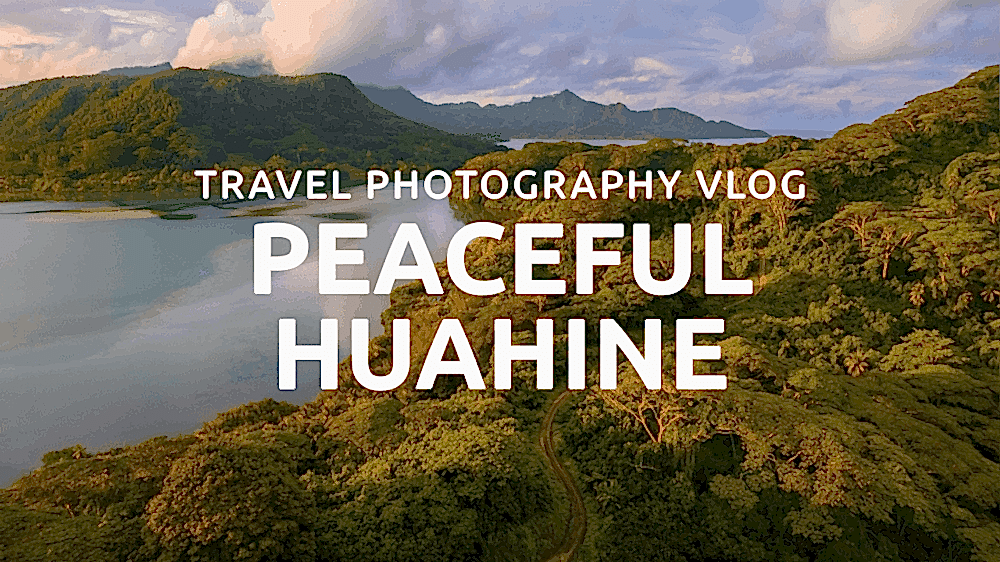 Lush green landscape of Huahine, French Polynesia under a cloudy sky