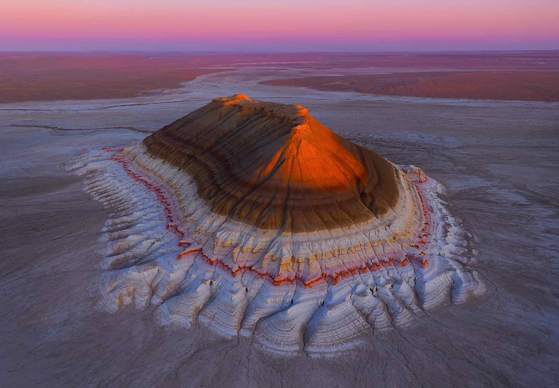 Sunrise illuminating Mount Bokty in Mangystau, Kazakhstan